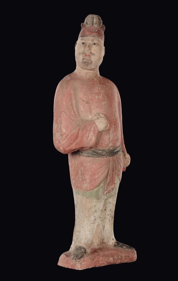 A painted pottery dignitary with hat, China, Tang Dynasty (618-906)