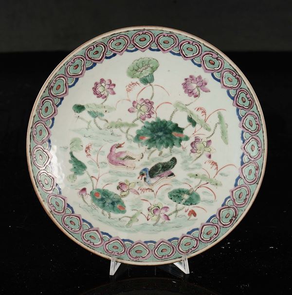 A Famille Rose dish with ducks and waterlilies, China, Qing Dynasty, 19th century