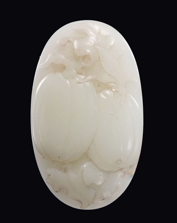 A white jade pendant with pumpkins in relief, China, Qing Dynasty, 19th century