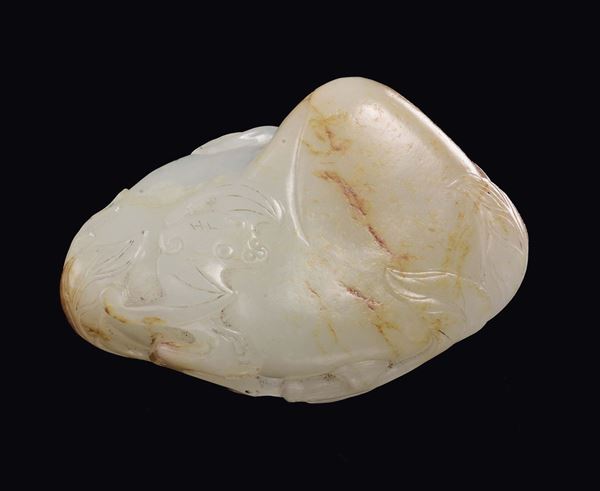 A white jade and russet bat and leaves group, China, Qing Dynasty, 19th century