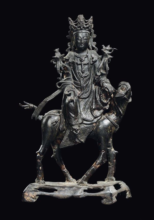 A bronze Guanyin on horseback figure, China, Ming Dynasty, 17th century