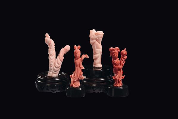 Four small carved coral figures, China, early 20th century
