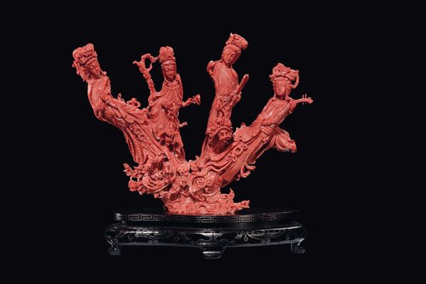 A carved coral group with four Guanyin, China, Qing Dynasty, late 19th century