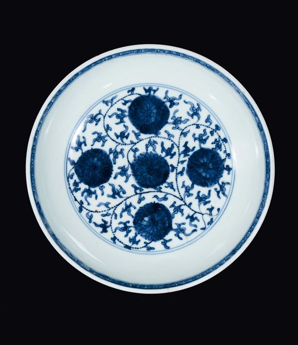 A blue and white porcelain dish with lotus flowers, China, Qing Dynasty, 19th century