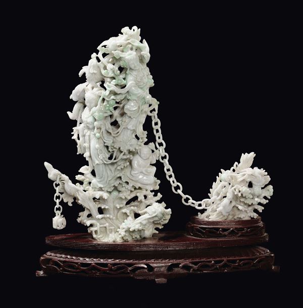 A white and aplle green jadeite Guanyin and birds group connected with chain, China, Republic, 20th century