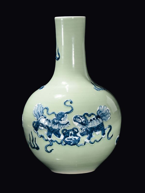 A Celadon porcelain vase with fantastic animals in relief, China, Qing Dynasty, 19th century