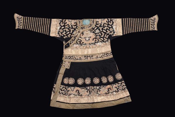 A silk dress black-ground embroidered with silver and golden dragons, China, Qing Dynasty, 19th century