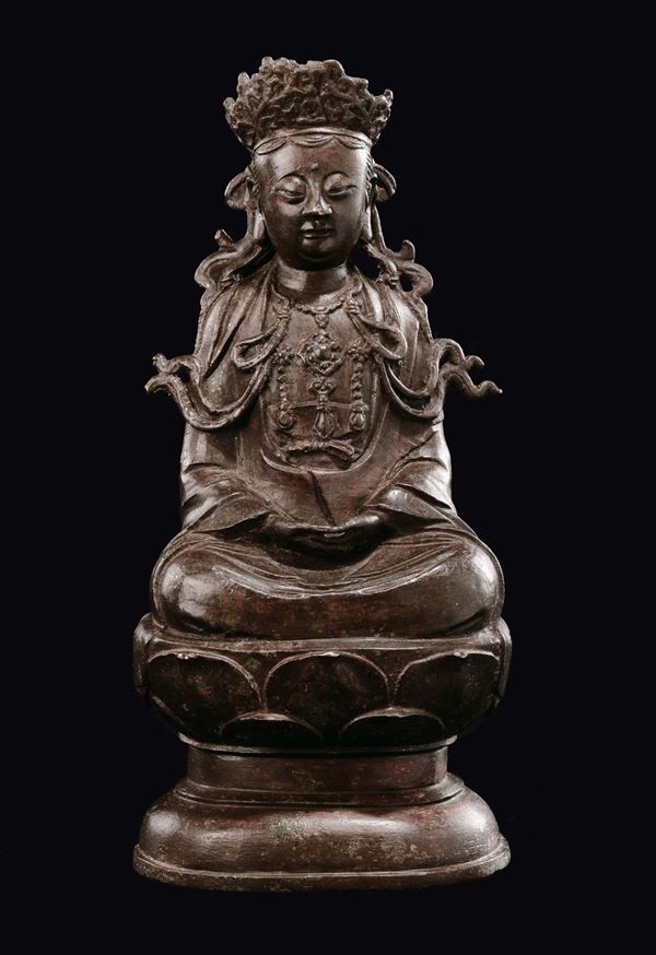 A burnished bronze Guanyin on lotus flower, China, Ming Dynasty, 17th century