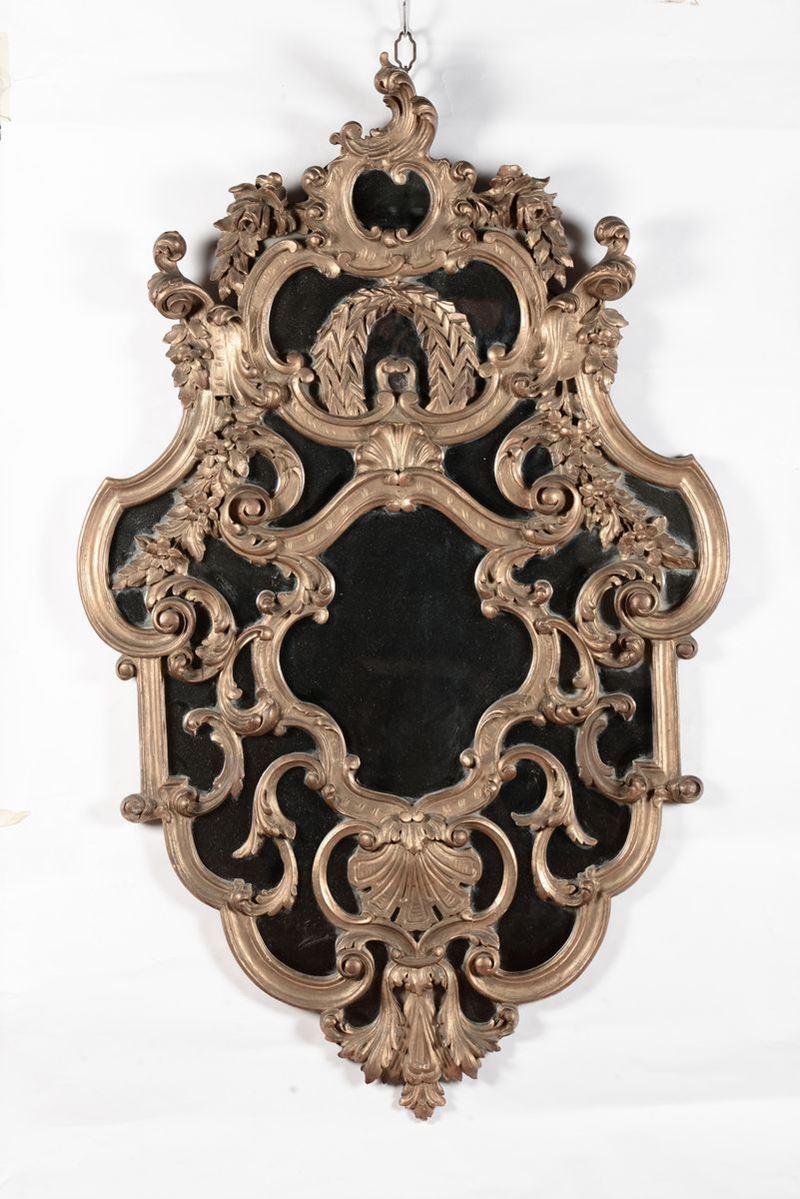 Specchiera in legno intagliato e dorato, XIX-XX secolo  - Asta Antiquariato e Dipinti Antichi - I - Cambi Casa d'Aste