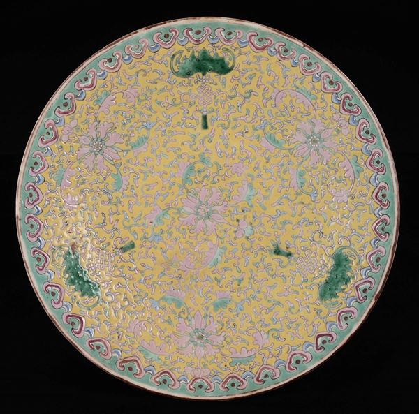 A pair of yellow-ground porcelain dishes with flowers and bats, China, Qing Dynasty, 19th century