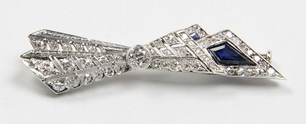 A diamond, sapphire and gold brooch