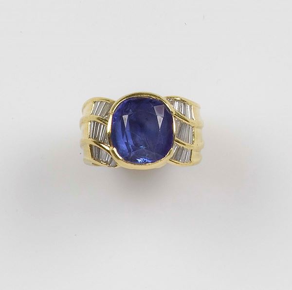A tanzanite and diamond ring. Mounted in yellow gold 750/1000