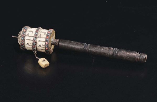 A carved bone and wooden prayer wheel, Tibet, late 19th century