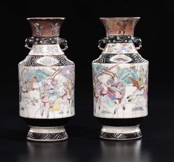 A pair of craquelè polychrome enamelled porcelain vases with battle scenes, China, Qing Dynasty, 19th century