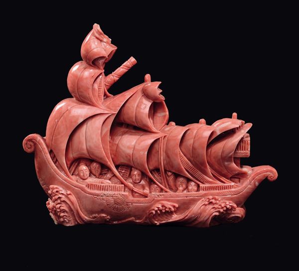 A carved coral sailer with figures, China, early 20th century