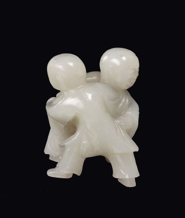 A white jade two fighting children group, China, Qing Dynasty, 19th century
