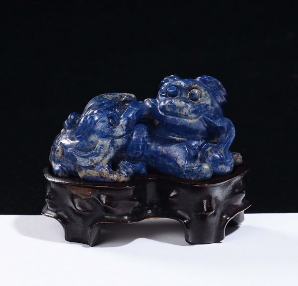 A lapis lazuli figure of Pho dog, China, Qing Dynasty, late 19th century