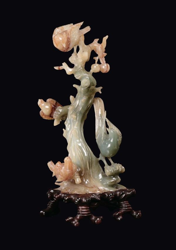A green and yellow jade birds on a branch group, China, Republic, early 20th century