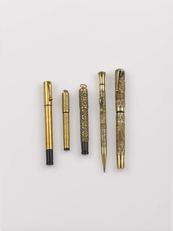 A lot containing five gold plated pens