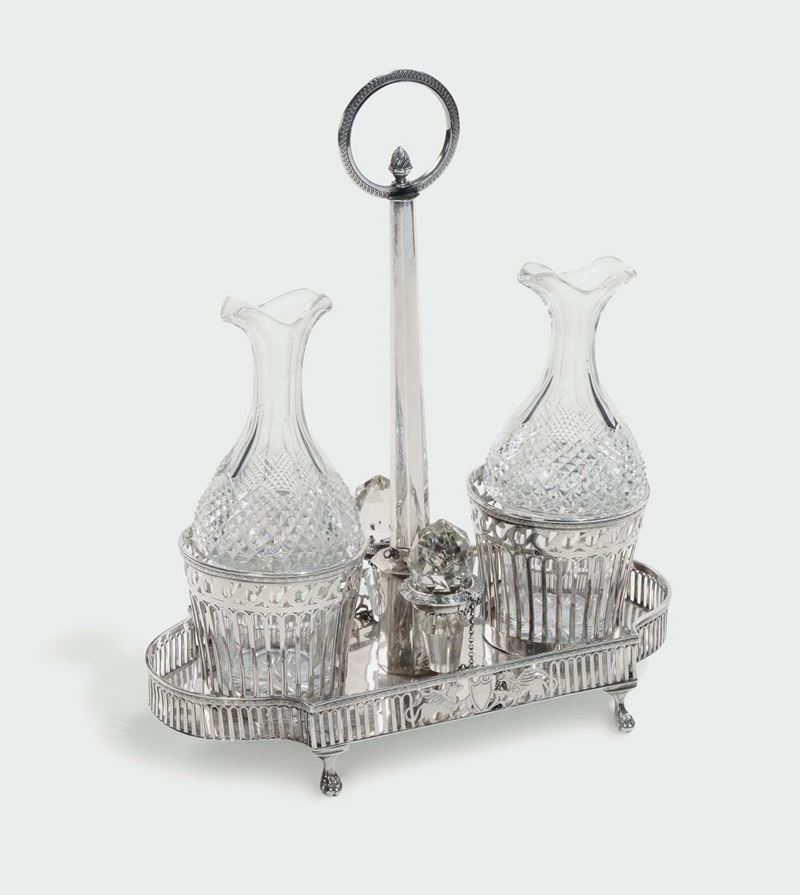 A molten, embossed, fretworked and chiselled silver oil jug, Paris mark used from 1797 to 1809 and by the silversmith  - Auction Fine Silvers - I - Cambi Casa d'Aste