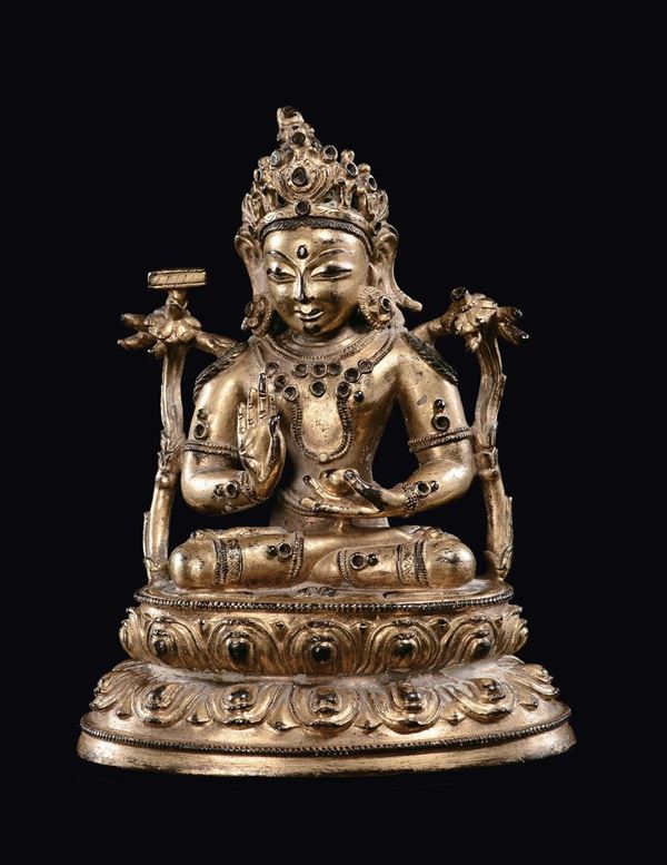 A gilt bronze figure of Amitaya on a double lotus flower, China, Ming Dynasty, 16th century