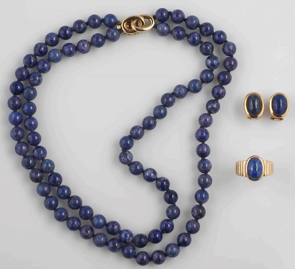 A gold and sodalite parure composed by necklace, earrings and a ring