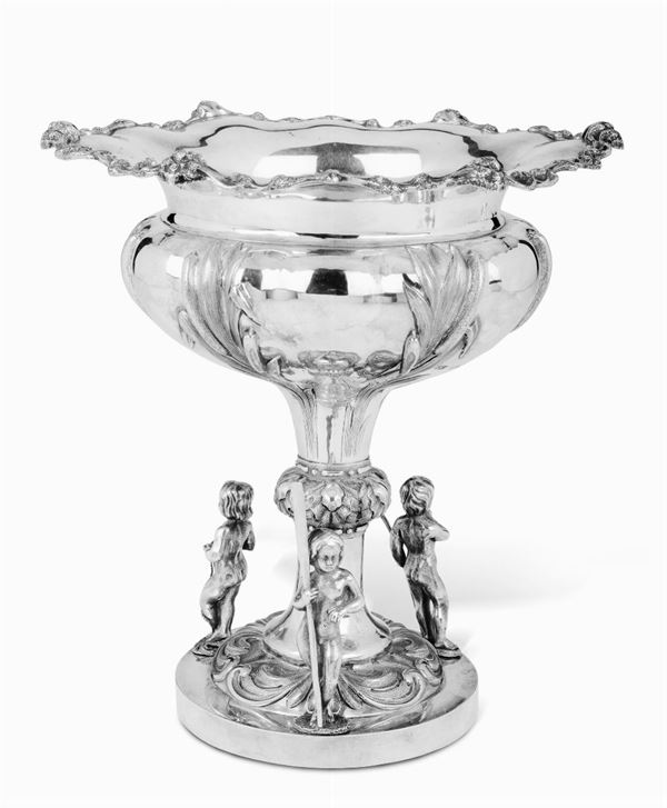 An embossed, molten and chiselled silver centrepiece, silversmiths Charles Thomas & George Fox, London 1856