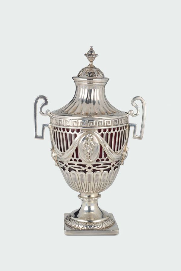 A silver two-handled vase with fretworked body, silversmith Samuel-Wood, London 1772