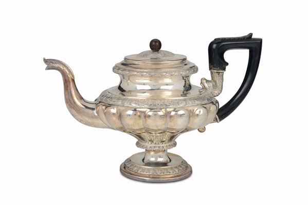 An embossed and chiselled silver tea-pot, silversmith Nicolai Lorentzen, Copenhagen 1841