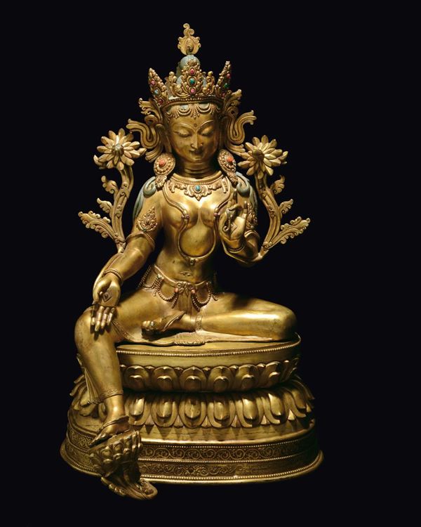A large gilt bronze figure of Tara on a double lotus flower, Tibet, 19th century