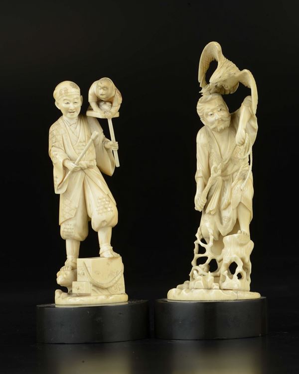 Three carved ivory figures, an hawker, a fisherman and a monkeys' trainer, Japan, early 20th century