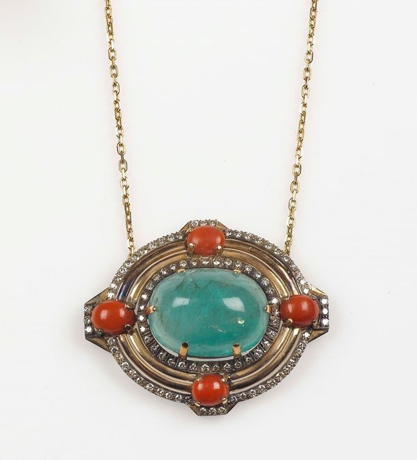 An emerald, coral, diamond and gold pendant
