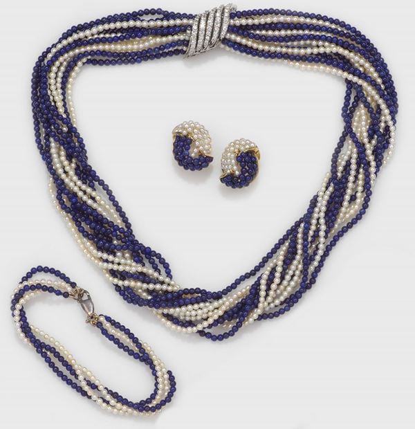 A pearl and lapis parure comprising a pair of earrings, necklace and bracelet