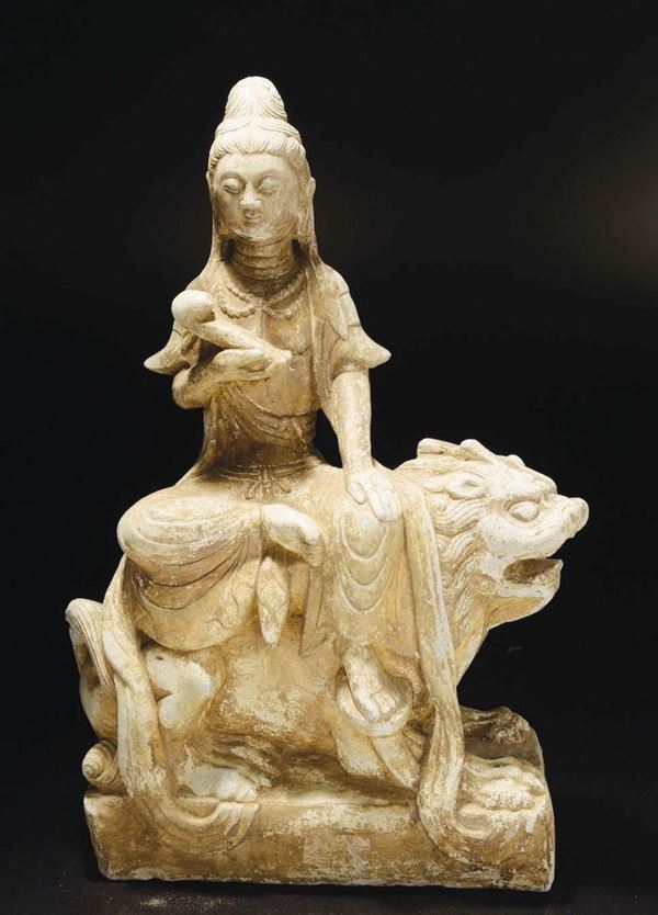 A stone figure of Amitayus with ruyi on Pho dog, China, Qing Dynasty, 19th century