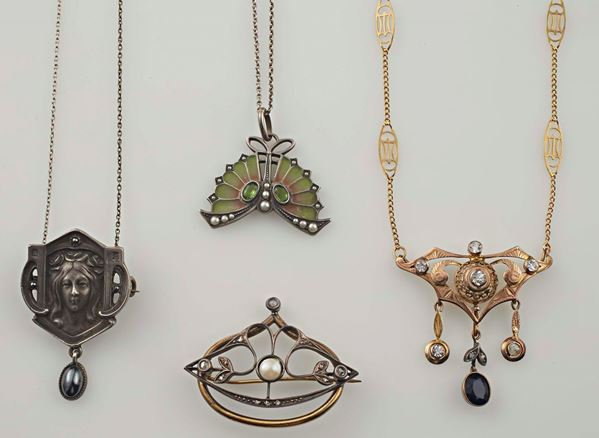 Three pendants and an Art Nouveau brooch