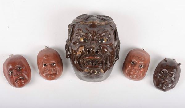 Five painted pottery mask, Japan, 19th century