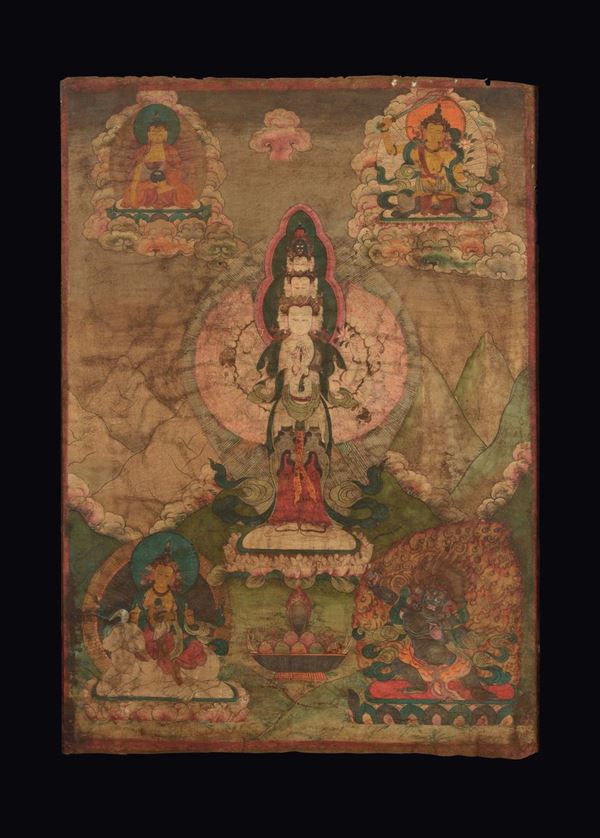 A framed tanka with deity with numerous heads, Tibet, 18th century