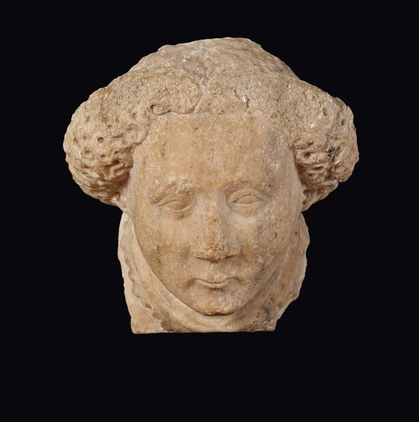 A marble deacon’s head, French-Gothic art, probably Bourgogne, 14th century