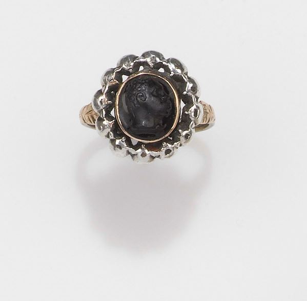 19th century cut steel and wood ring
