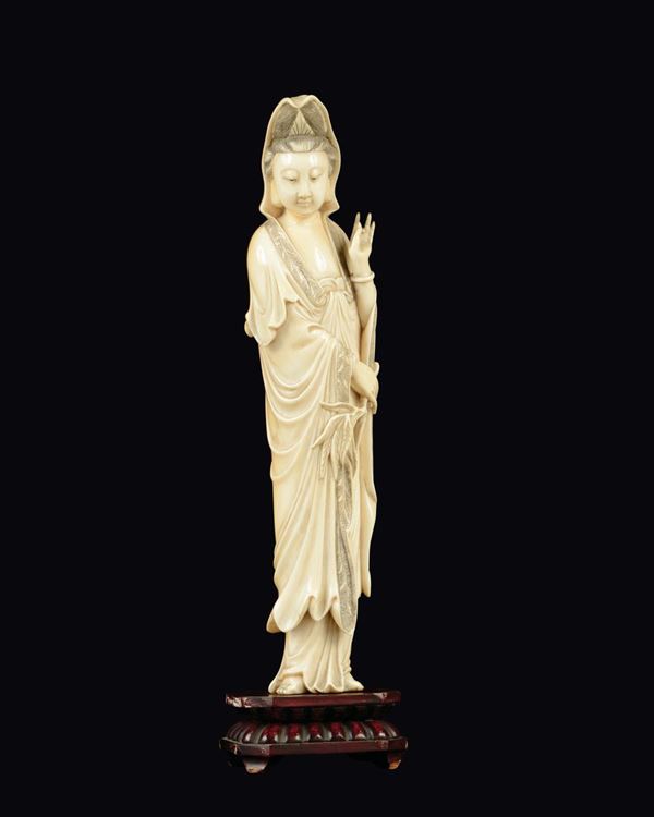 A carved ivory figure of Guanyin with veil, China, Qing Dynasty, late 19th century
