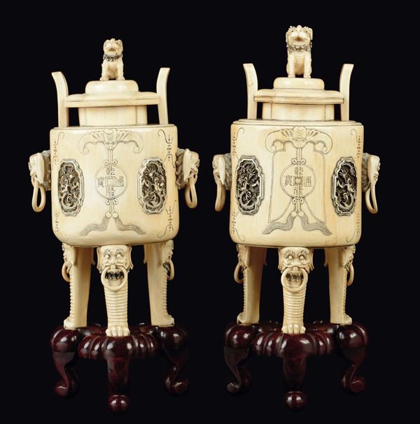 A pair of carved ivory tripod censers and cover, China, early 20th century