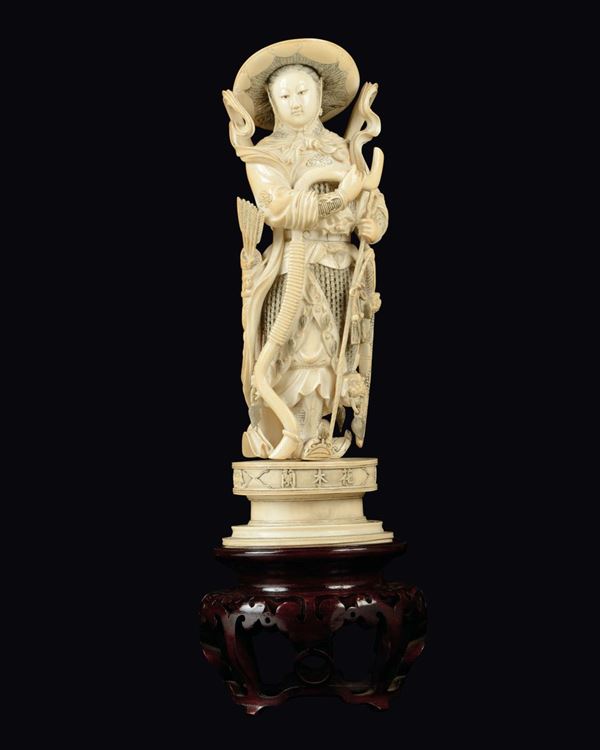A carved ivory warrior Guanyin figure with a bow, arrows and a sword, China, Republic, early 20th century