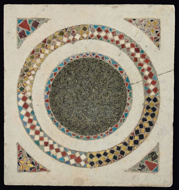 A white marble slab with geometric figures, coloured and gilt vitreous pastes, southern Italy artists, 13th-14th century