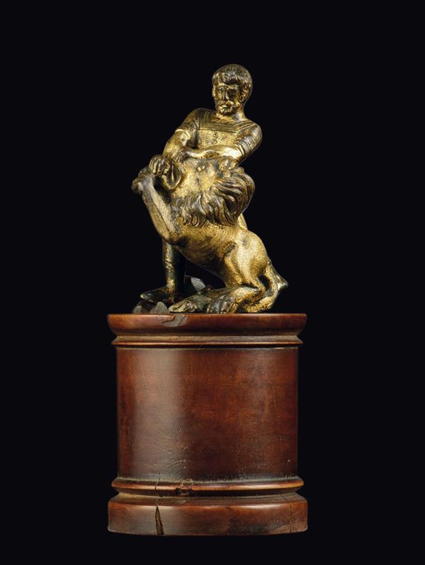 A molten, chiselled and gilt bronze Samson killing the lion sculpture, Germany 16th-17th century