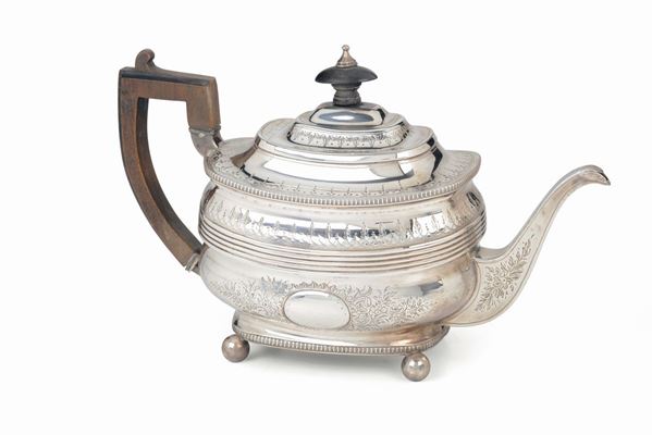 A chiselled silver tea-pot, silversmith John Wakefield, London 1807/08