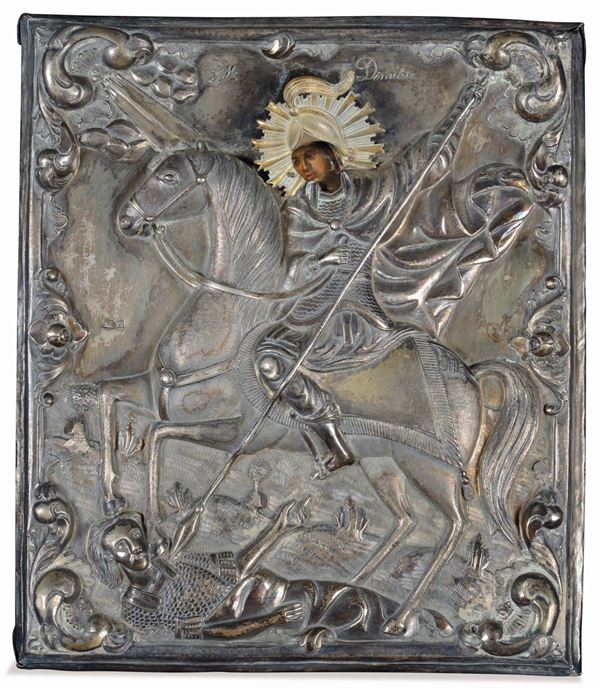 A silver plated riza icon with maker's mark AD 14 and incision SM di Mitrie, Poland 1848
