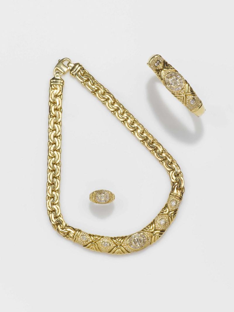 A diamond and gold parure comprising necklace, bangle and ring  - Auction Fine Jewels - II - Cambi Casa d'Aste