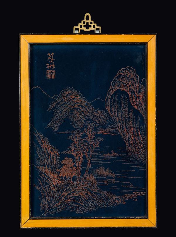 A rare blue-ground porcelain plaque engraved and red-glazed depicting a mountain landscape, China, Qing Dynasty, late 19th century