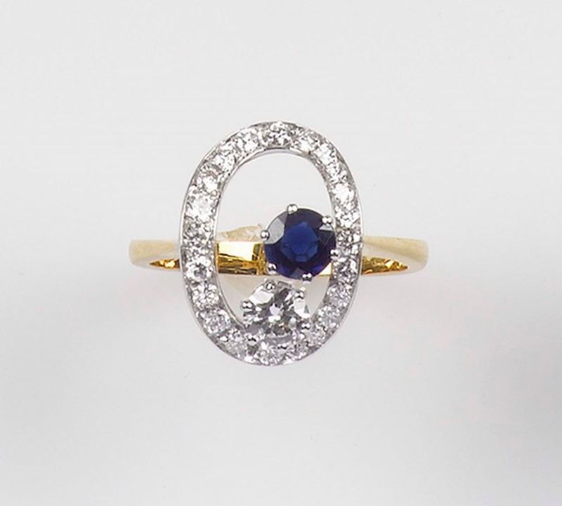 A diamond and sapphire ring. Mounted in yellow and white gold 750/1000  - Auction Fine Jewels - Cambi Casa d'Aste