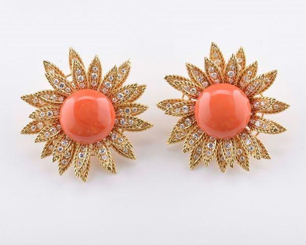 A pair of coral and diamond earrings